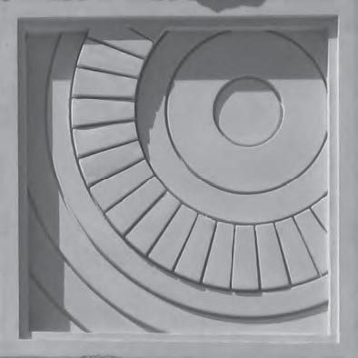 A spiraling wheel garage medallion